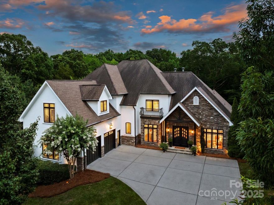 Tucked away in highly desirable Providence Plantation, this estate is an entertainer's dream! This home features a multitude of interior & exterior gathering spaces, saltwater pool/spa & lush mature landscaping in a private cul-de-sac setting! The main level of the home features expansive accordion style doors leading to a large terrace with breath-taking views of the back yard oasis--pool & spa, pool cabana & covered veranda w/ fireplace. The primary bedroom has 3 separate closets, a luxurious bath with heated floors and is located on the main level as well as a guest suite with zero entry shower and wide doors to accommodate any mobility challenges. Each secondary bedroom has an ensuite. The additional lower level 2 car garage provides no steps to enter which is ideal for multi-generational living! The lower level has an oversized guest suite, kitchen/bar area, theater room, wine cellar, billiard room, and exercise room with sauna! Don't miss this meticulously maintained home!