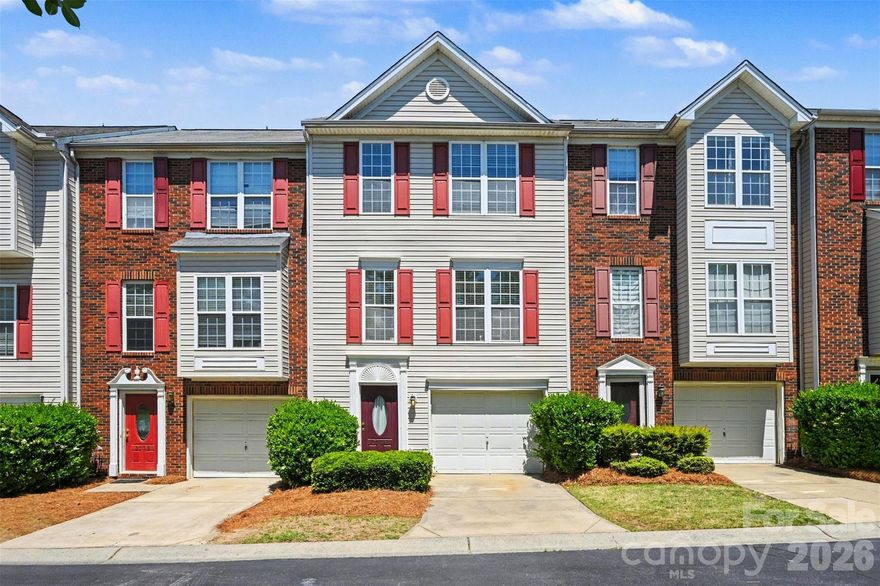 Well-kept three-level townhome with thoughtful updates and easy, comfortable living. LVP flooring runs throughout, giving the home a clean, cohesive feel. The kitchen features quartz countertops, plenty of cabinet space, and a water filtration system, and opens right into the main living area with 9’ ceilings and a fireplace that makes the space feel warm and inviting. The lower level works great as a rec room, office, or flex space depending on your needs, and the attached garage adds extra convenience. Several appliances and light fixtures were updated within the last two years. The community includes a clubhouse, pool, dog park, playground, and walking trails, making it easy to enjoy both indoors and out. A great option for low-maintenance living in a convenient location!