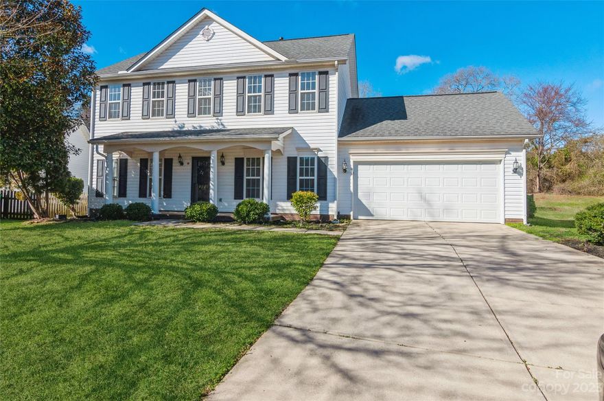 This well-maintained beauty sits on a flat, fenced .41 yard, backing up to natural area. The home has brand new LVP and carpet throughout and the whole interior has been freshly painted, including all ceilings and trim.  The eat-in kitchen has newly installed granite countertops with an undermount stainless steel sink and new appliances. The huge flex space with cathedral ceilings off the family room is separated by glass French doors w/mini split.  Gorgeous view from your new sitting room/office/home-gym of the natural area. Home is in move in ready condition and available for quick closing. The sidewalks add to the charm of this neighborhood featuring a pond, park and playground.  Walking distance to Blakeney shopping center.  2023 HVAC and duct work. 10/2011 Roof.
Refrigerator, washer, dryer convey.