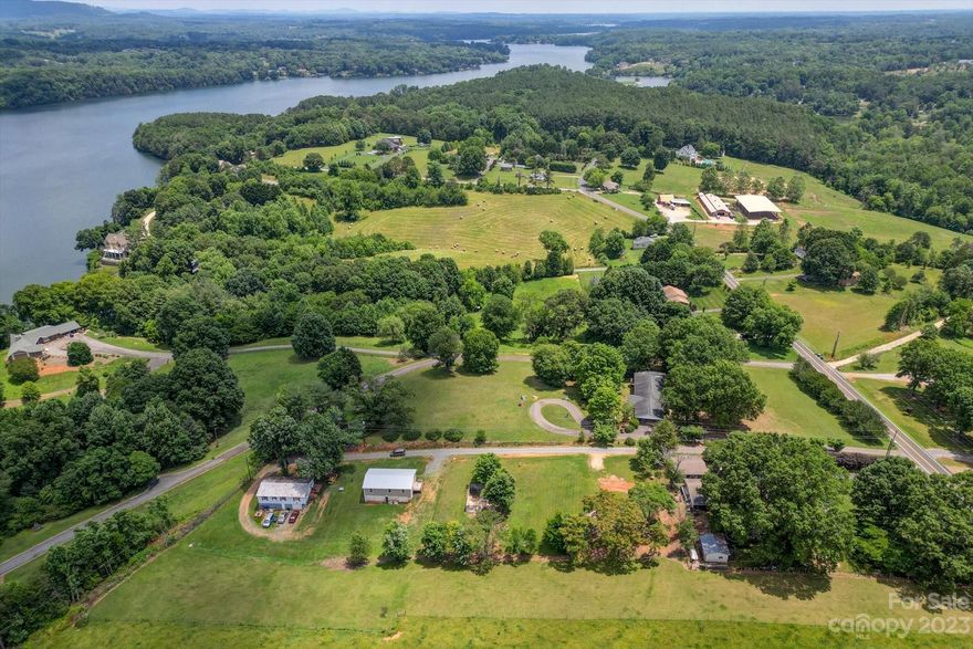 Beautiful acreage close to Lake Hickory, shops and restaurants. Mobile homes and duplex are allowed. Minutes to the local boat ramp. This 1.30-acre lot has tons of privacy. There is plenty of area to build your dream home or subdivide and place multiple homes on the acreage. This one won't last long so hurry and take a look before it is too late! Zoned R-1. There was an old mobile home on lot in the past and it may have a septic and well but seller is unsure.