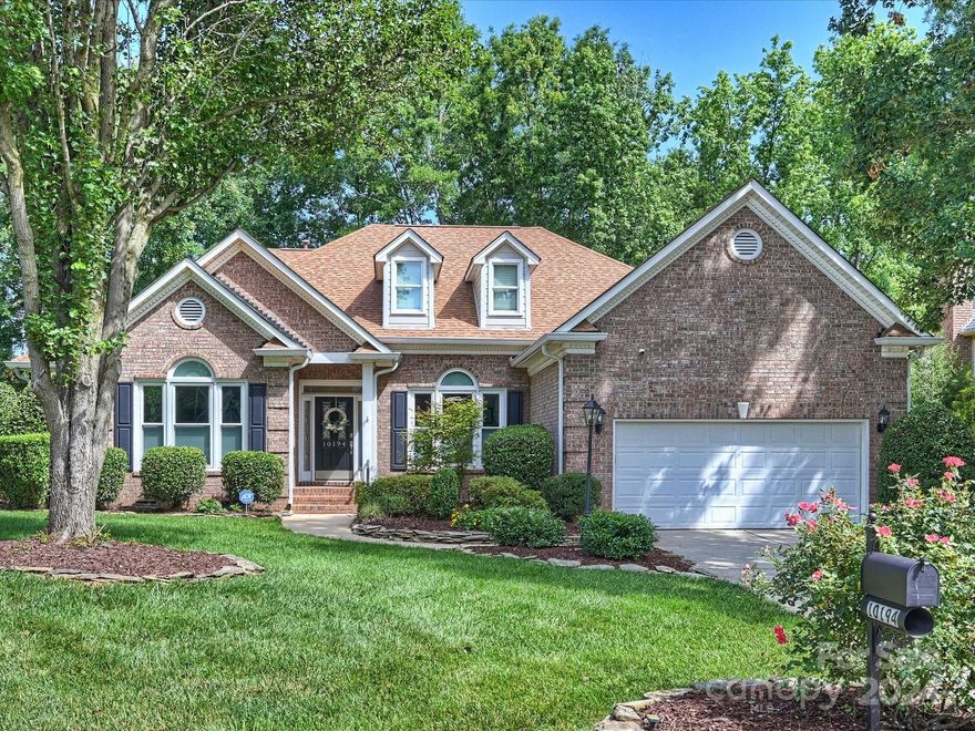 Beautiful 4-bedroom RANCH in highly sought after Ballantyne's Cobblestone neighborhood. Super curb appeal on a corner lot! This "like new" home lives big with an open floor plan & cathedral ceilings. Gas log fireplace & 2 skylights in the Great Room.  Vaulted ceilings & French doors in office/living room. Bright sunroom & private patio are perfect for entertaining and enjoying the view of the pond. Landscaped, treed & fenced backyard. Kitchen with Kitchen Aid SS appliances & breakfast bar & dining area.  Tray ceiling in Primary bedroom. Primary bath has tub, separate shower, double sinks & custom walk-in closet. Jack n Jill bathroom.   James Hardy Plank siding .  Large attic for storage. Close to shopping, dining, entertainment, schools & 485. THIS IS IT