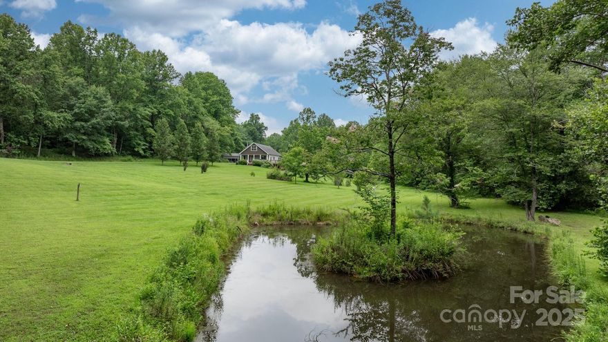 STOCKED POND, CREEK, MULTIPLE OUTBUILDINGS, & SEVEN ACRES!!! WELCOME HOME! 
Discover the perfect blend of tranquility and functionality with this 3-bedroom, 3-bathroom home nestled on 7 private acres in Taylorsville, NC. Enjoy your own stocked pond, ideal for peaceful afternoons of bass fishing right in your backyard. A meandering creek adds to the natural beauty and charm of the property, while multiple outbuildings offer space for hobbies, storage, or animals. Whether you're looking for a mini homestead or a serene retreat, this property delivers space, privacy, and potential—all within reach of modern convenience.