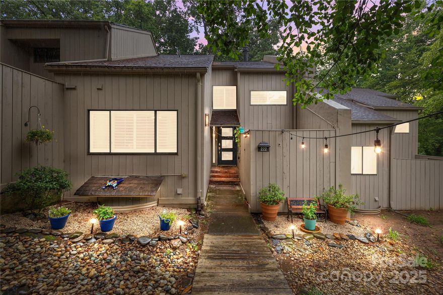 Enjoy peaceful living in this 4-bed, 3-bath townhome located in the gated community of River Hills. This tranquil treehouse features an open floor plan & 2,400 square feet of low-maintenance living. The main level includes a guest bedroom or office with a full bath that is newly renovated. The primary suite has been renovated and boasts an extended 8-ft deck with seasonal water views. Enjoy the comfort of new AC units and a screened-in porch on the main level. A coffee bar has been added to the home for easy mornings. The fully finished basement with new bamboo flooring and shiplap ceiling, includes two bedrooms, a full bath, laundry area, and access to the spacious terrace. Just step away from the lake, condos have their own dock and pool. River Hills offers 24-hour security and amenities including a marina, private beach, golf course, fitness center, walking trails, tennis courts, clubhouse, and more.Rental option too!