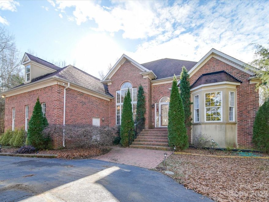 Imagine a home where every detail is a nod to comfort and nature's beauty. Welcome to 1581 Mary Ellen Dr, Fort Mill. This 4-bedroom, 3-bath estate, spread over 1.82 acres, offers a sanctuary of peace. The basement is a world of its own with a kitchenette, ample storage, and workshop. Step outside to the melody of nature with your own pond, dock, and fountain. The large deck and patio offer serene views and entertainment space. Cozy up by the fireplace or explore nearby parks and shopping. This home isn't just a residence; it's a lifestyle.