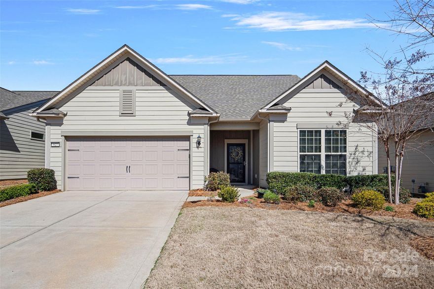 Welcome home to this stunning 3 bedroom, 3 bathroom home in the highly sought after 55+ community of Carolina Orchard! Primary bedroom on the main floor, stainless steel appliances in the kitchen, cozy living room with a gas fireplace, spacious screened in porch and a beautiful paver patio area. Don't forget to check out the ample storage space in the attic! Community amenities include indoor/outdoor pools, tennis, pickleball, included lawn care, and more. Don't miss your chance to make this exceptional property your new home! Schedule your showing today and experience the best of Fort Mill living at 927 Kirby Drive.