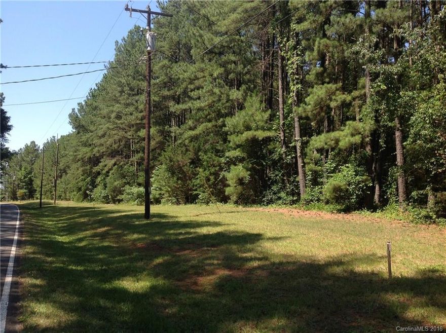 Great Opportunity to build your own home at the end of Brawley Peninsula on Brawley School Road.  Beautiful flat 2 acres, 296 feet lot frontage located outside of the Point and Trump National Golf Course.  No building restrictions and ability to join Trump National which is minutes away.