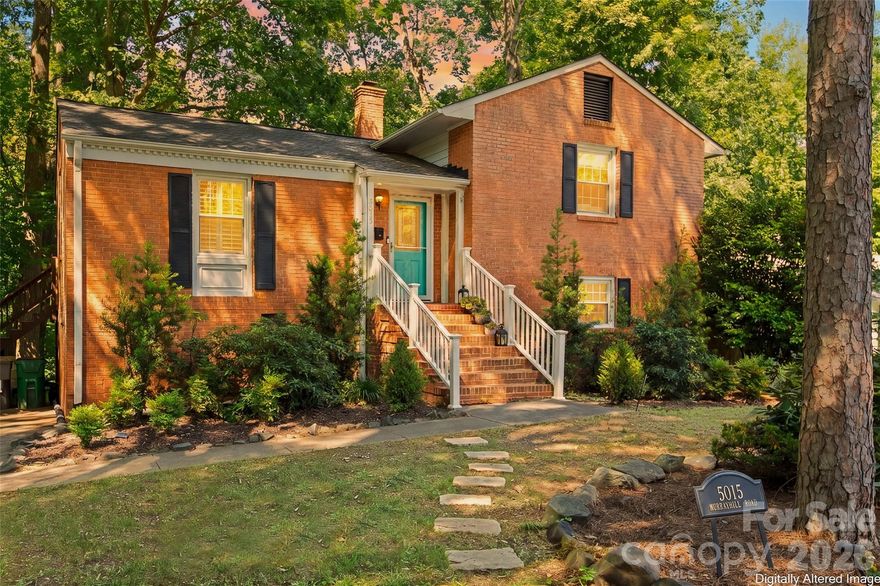 Madison Park living feels different, tucked beneath mature trees and moments from everything Charlotte has to offer, this beautifully updated full brick home blends warmth, character, and an unexpected sense of retreat.

Inside, hardwood floors run throughout the main and upper levels, complemented by plantation shutters, updated electrical, stainless steel appliances, granite countertops, and a timeless tile backsplash. The flexible layout offers a natural separation of spaces, with the primary suite privately positioned on the lower level featuring a custom closet, beautifully renovated bath with built-ins, convenient laundry access, and direct access outdoors.

Step outside and the story of this home really begins

A terraced yard with retaining walls, mature landscaping, and a large privacy fence create a backyard that feels tucked away from the city while still being right in the center of it all. Overlooking a peaceful creek, the outdoor space has already been thoughtfully transformed into a functional foundation for relaxing, entertaining, gardening, or creating your own personal outdoor oasis. Whether you envision evenings around a fire pit, expanding the garden, or simply enjoying the quiet surroundings, the possibilities here feel endless.

With two additional bedrooms on the upper level, generous storage throughout, and thoughtful improvements already in place, this home offers the rare combination of comfort, character, and opportunity all in one of Charlotte’s most beloved neighborhoods.
