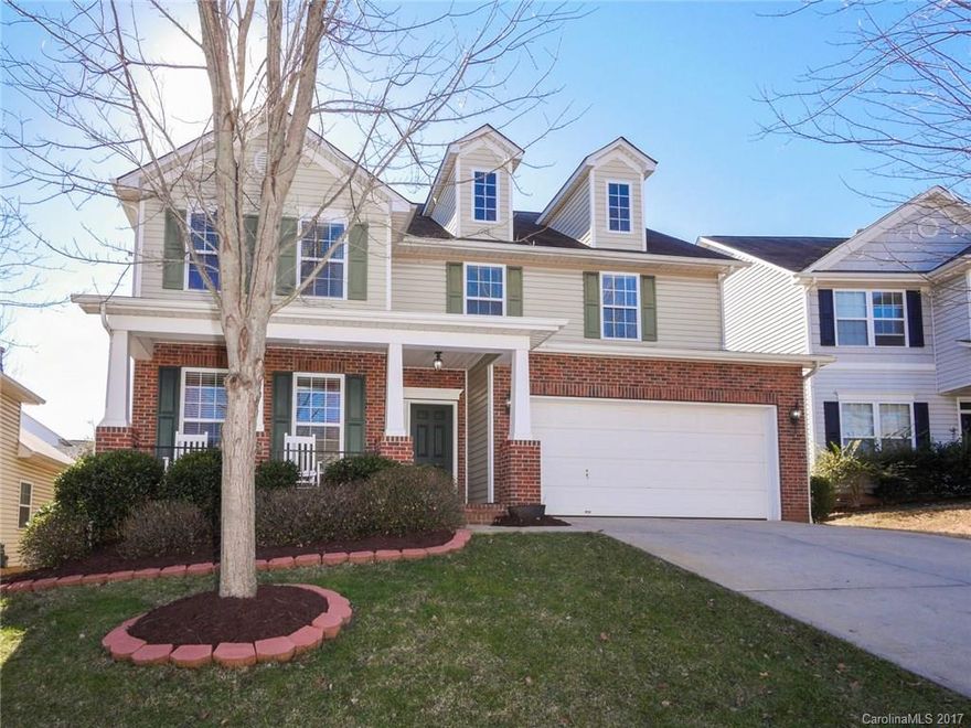 Wow entertaining house! Freshly painted interior, hardwd flrs thru main level, crown & chair rail molding, & new carpeting, & upgraded fixtures. Gorgeous Kit w/rich wood cabinetry, granite, glass tile, & stainless incl wine fridge. Huge master ste w/trey ceiling, sitting area, fireplace, dual vanity sinks, garden tub, & walk-in closet. PVT backyard w/mature cypresses. Comm amenities incl multiple pools, playground, tennis, & more. Close prox to I-485 & University area shopping & restaurants.