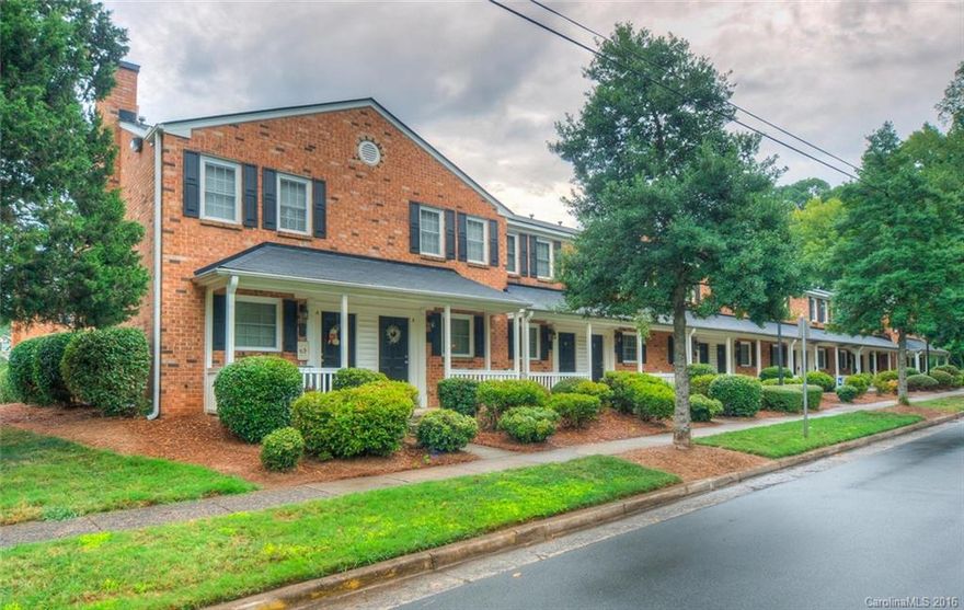 Desirable full brick townhome style condominium in Plaza Midwood area.  Fresh neutral paint throughout, stainless steel appliances including refrigerator, stack washer/dryer, granite countertops, hardwood laminate floors on main level, country front porch, enclosed back patio area, close to great shopping and restaurants.