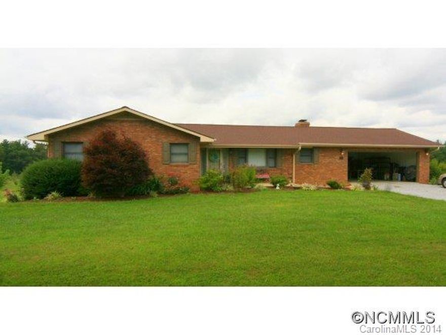 Beautiful Brick Ranch in the country on 2.5 unrestricted acres only 7 miles from I-26. Rear of property is pastured, fenced & ready to farm. Home features 1800 sq' heated on main level & 1800 sq' unfinished in basement, 3 bedrooms, 2 baths, large great room w/cathedral ceilings, brick fireplace, country kitchen w/breakfast bar, dining room, nice master suite, 2+ car garage & large rear deck overlooking property. Includes adjoining parcel.