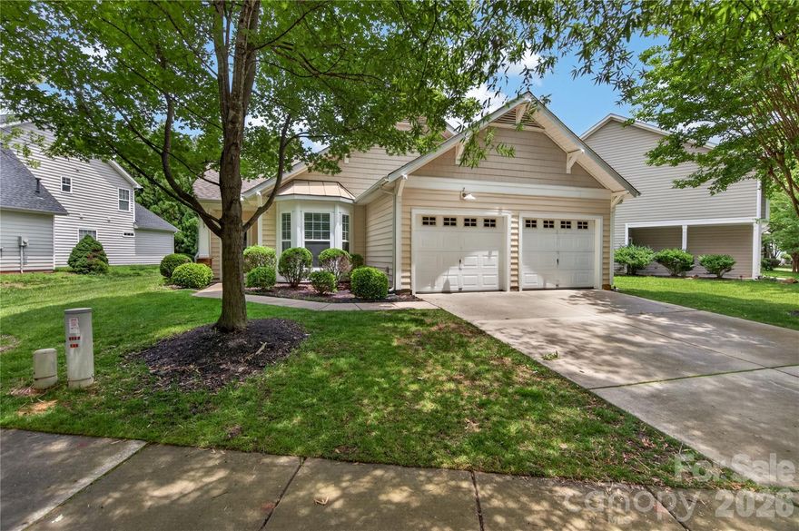 Welcome home to this adorable Craftsman-style ranch in the highly sought-after Callonwood community! Featuring a maintenance-free exterior with charming stone accents, this light-filled open-concept floor plan offers volume ceilings, gleaming hardwood floors throughout the main living areas, and an inviting flow perfect for everyday living and entertaining.
The spacious kitchen showcases warm maple cabinetry, solid surface countertops, and overlooks the bright and airy family room. A desirable split-bedroom floor plan provides added privacy, while the primary suite impresses with a vaulted ceiling, oversized walk-in closet, and spa-inspired bath complete with a relaxing garden tub, separate shower, and ceramic tile flooring.
All bedrooms feature durable luxury vinyl plank flooring, and Bedroom 3 offers exceptional versatility with sunny bay windows and elegant glass French doors — ideal for a home office, study, or guest room. The secondary bath includes ceramic tile flooring and a tub/shower combination.
Outside, enjoy a beautifully landscaped level lot with irrigation and an expansive backyard perfect for outdoor enjoyment. Additional highlights include an oversized two-car garage and low Union County taxes.
All of this in amenity-rich Callonwood, just minutes from downtown Matthews, the Brace Family YMCA, shopping, dining, parks, and more!