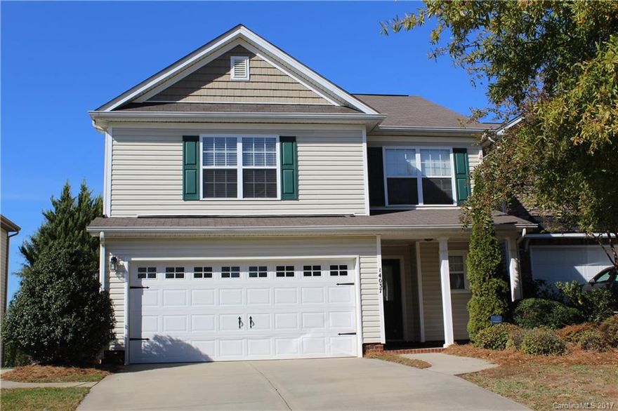 FORMER MODEL HOME with spacious 3 bedrooms and an open Loft, charming kitchen, 2 story great room with gas fire place, inviting master suite, high ceilings, lots of natural light and lovely private back yard. The garage is finished and heated, just perfect for a study or den. Excellent opportunity!!