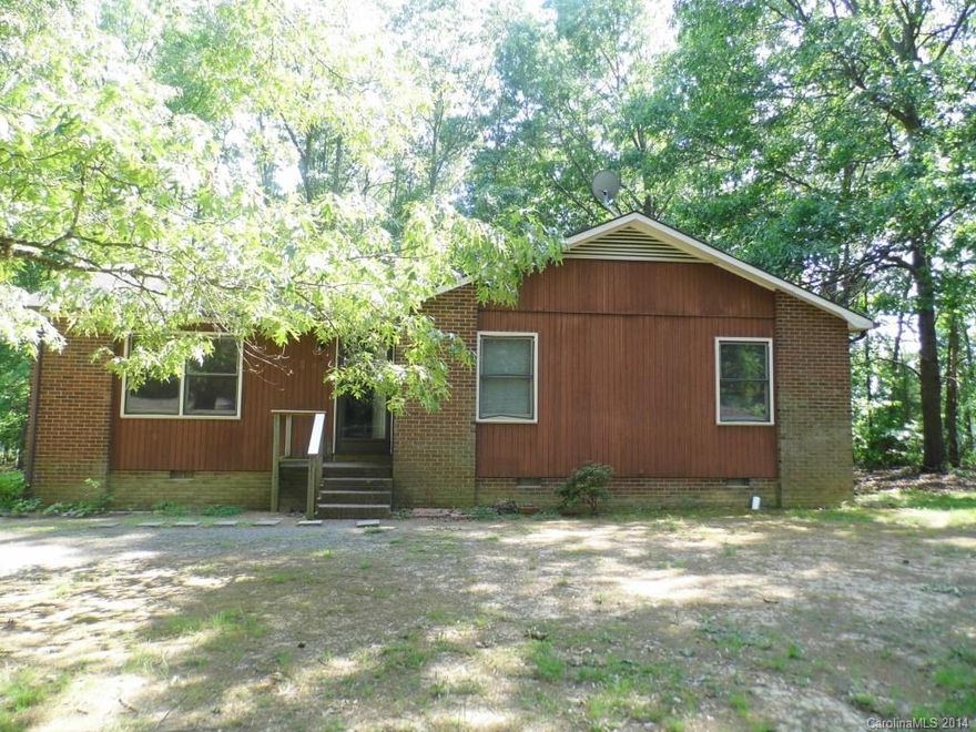 Reduced for possible short-sale. Bring us an offer! This home is located on a spacious lot with trees and has a great backyard. The tidy outside of this home is a welcoming sight! Home has a nice flow including sliding glass doors in the dining room that overlook the deck and backyard. Nice sized rooms are ready for your personal touch. It needs some other cosmetic updates, including paint and floor coverings,  to give it a more modern look. After needed repairs this could be an adorable home!