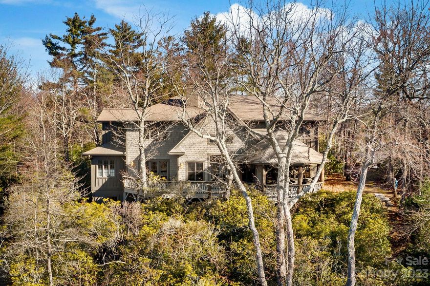 This 2005 post & beam rustic home is situated at 3,300 feet in the tranquil landscape of Lake Toxaway Estates. Revel in year-round panoramic views of the lake and mountains, accompanied by the invigorating mountain air that beckons relaxation. Boasting four bedrooms, a native stone fireplace, and a covered deck, this home is meticulously designed for family, friends, and unforgettable gatherings.

Lake Toxaway is an ideal location with Panthertown Valley, Pisgah National Forest, Gorges State Park, and the Blue Ridge Parkway in close proximity. Charming towns like Highlands, Cashiers, and Brevard are all within a 45-minute drive.

A quick 50-minute drive from Asheville Regional Airport, this prime real estate is strategically positioned within easy reach of major cities like Atlanta, Greenville, and Charlotte.

POA - https://laketoxawaycommunity.net/
Marina - https://www.laketoxawaymarine.com/
Country Club - https://www.laketoxawaycc.com/