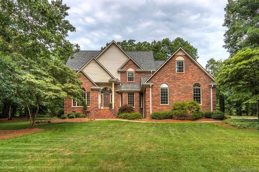 Motivated Seller, Bring Offers! Gorgeous custom full brick home overlooking the 6th hole of the Warrior Golf Club! Gourmet kitchen features custom cabinets, granite, Stainless appliances, & hardwood floors. Many custom features including laundry shoot, extensive moldings, putting green, & full bath in garage!  4th Bedroom/Bonus room is full of options, & has separate staircase leading to full bath in garage. Close to Mooresville-Concord-Kannapolis-Salisbury. Walk to the clubhouse for dinner.