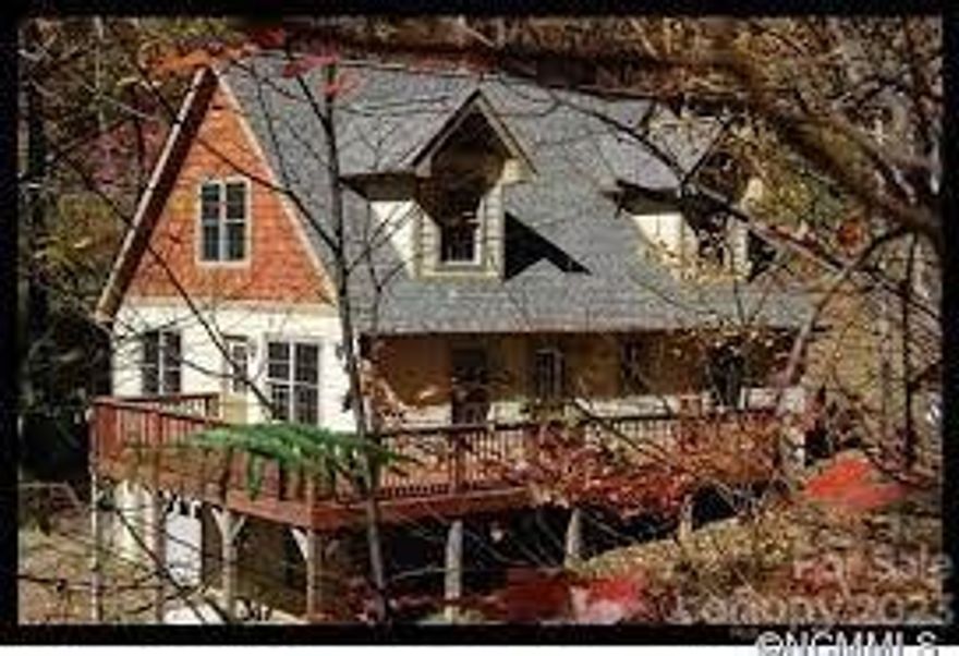 Major Price Improvement makes this beautiful home ready to go. Tucked away in the Reems Creek area of Weaverville, NC, just outside of Asheville, you will find this fantastic home sitting at 3000' elevation. Enjoy your Koi Pond while sitting on your deck and having your morning coffee. Wintertime views, a convenient gas fireplace, and summer recreation are all part of the package with this beautiful home. Drive just 12 minutes to downtown Weaverville, where you can enjoy the conveniences of the suburbs and fine dining. Schedule your showing today.