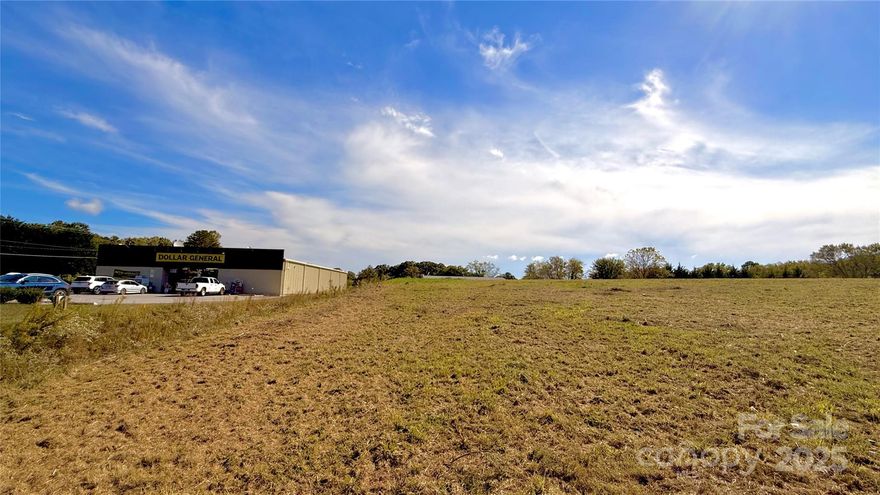 Prime Location Alert! Situated right next to Dollar General on Glenn Bridge Rd/Brevard Rd, this property offers excellent visibility and accessibility. City water and sewer are already connected, and the county has approved an entrance from Brevard Rd directly to the site. Endless potential—perfect for multifamily development, a gas station, retail space, or a restaurant!