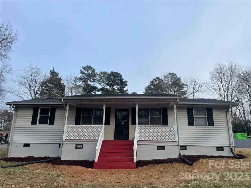 Beautiful cozy house in a quiet neighborhood, large lot.  There is a large hanger type garage in the backyard which you can make your own car shop. large water well and septic system according to the previous owner. newly renovated, new flooring, fresh paint, Deck Partially renovated with new wood