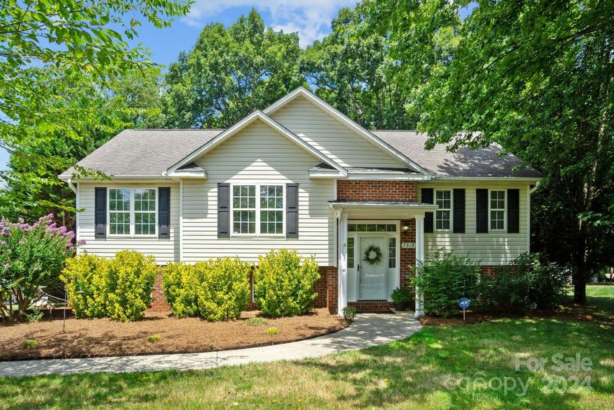 Welcome to this charming split-foyer home with updates! This residence boasts 3 bedrooms & 2 1/2 baths. Inside, enjoy the elegance of LVP & hardwood floors w/carpet in the bedrooms. The living room is highlighted by a fireplace w/ gas logs, perfect for relaxing evenings. The kitchen includes a dining area that opens to a screened back porch ideal for enjoying serene outdoor meals or entertaining. The primary suite offers a tray ceiling, crown molding, & an en-suite bath featuring a double vanity, garden tub, stand-alone shower, & a walk-in closet. The finished basement includes an office & a flex area for various uses. The attached garage has 2 garage doors. Outside, you'll find a patio under the screened porch, a block patio area, a 12' x 16' building w/garage door, & a privacy-fenced backyard—perfect for gatherings & relaxation. Recent updates include fresh paint, a 2022 HVAC, & 2023 gas water heater. Don't miss the opportunity to call this lovely home yours!
