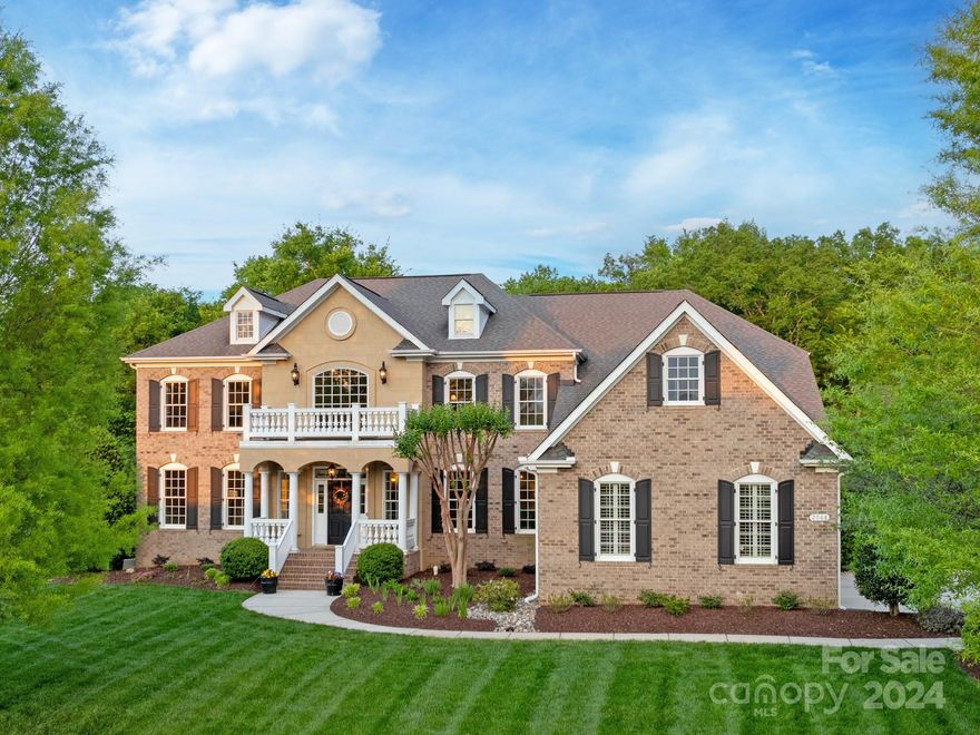 An EXQUISITE estate located in the desirable & established community of Marvin Creek w/ amenities abound including miles of walking trails, tennis and basketball courts, a fitness center, olympic pool and lazy river, as well as an active social committee for events.The home is on a large pristine lot with a wooded backyard that is enjoyed year round on the 4-season porch w/ its stack stone gas fireplace, stunning bead board ceiling & extended grilling deck.The huge bright walk-out basement to a flat, private park like yard is perfect for an in-ground pool.The basement boasts a kitchen, custom media room, work-out space and a guest (or in-law) bedroom with a jacuzzi.The gourmet kitchen has SS appliances and extensive space for preparing meals and entertaining on its oversized island. Primary bedroom boasts 2 separate custom his and her walk-in closets, a sitting room and a separate room for an office or craft room. Secondary bedrooms each have a private bath w/tub.