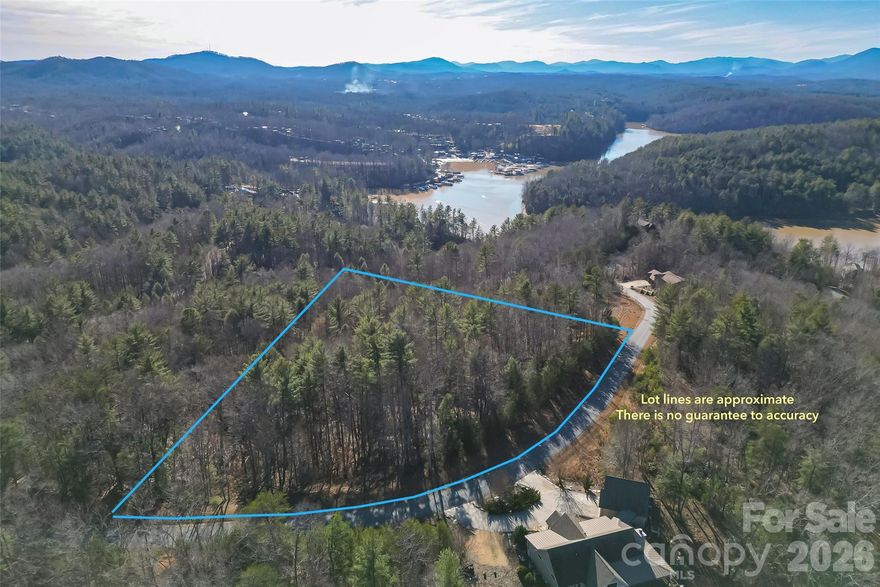 Discover the perfect setting for your mountain and lake retreat with this newly available 3-acre interior lot at Lake James. Nestled in The Arbor at Lake James, this property features long-range mountain views and a peaceful, wooded setting with ample space to design and build your custom home. Enjoy the best of lake living with a deeded boat slip, providing convenient access to the pristine waters of Lake James. Surrounded by the natural beauty of Western North Carolina, this property delivers the ideal balance of serenity and adventure—just minutes from boating, hiking, and outdoor recreation. Conveniently located just 10 minutes from downtown Marion, you’ll enjoy easy access to local shops, dining, and everyday essentials. The property is also only 45 minutes from Asheville, making it easy to enjoy a vibrant food and arts scene.