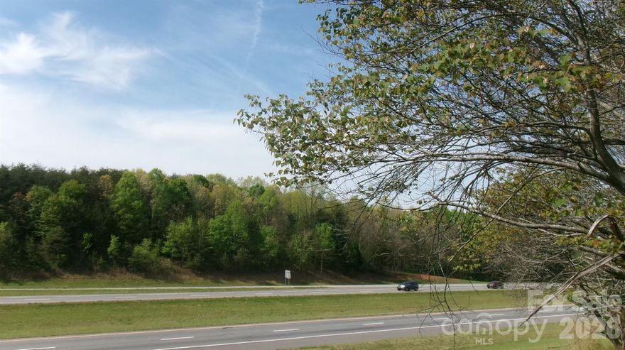 3 parcels of vacant land totaling 25.51+- acres. Located on the East bound side of interstate 40 just west of Hickory, NC at exit 121. This property has great exposure to I-40 with over 1500 feet of frontage. It is accessed just off I-40 Exit 121 to the South on Old Shelby Road. There are 2 access points, Oglesby Lane and a second access, 1887 Old Shelby road which is a .67 acre lot currently zoned R-1. A 3rd lot of 5.31 acres is currently zoned R-1 and does not touch the other 2 lots. There are power lines on this parcel.