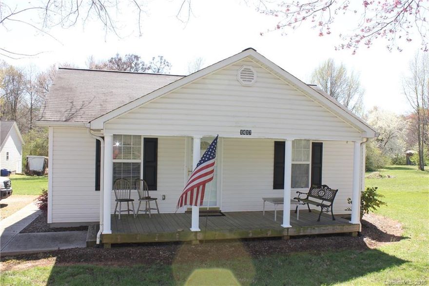 Cute 2 bedroom cottage style home on over three quarters of an acre with large shop building in rear.  large yard, woods to the rear.  Conveniently located in West Iredell, easy access to both I-77 and I-40.  Though built in 1952 the seller stripped this home to the studs and totally renovated it to like new.  Seller owns the lot and partially renovated (about 70% complete) home next door (nice craftsmanship on both), would make great investment to buy both properties and rent one or both out.