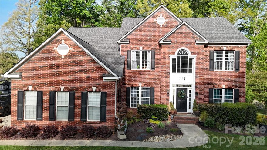 Tucked away in Muirfield and just minutes from Mooresville Golf Club, on the Nines, Alinos and all that downtown has to offer.  This 5-bedroom home checks all the boxes—and then some. The kitchen features Café appliances and flows easily into the main living areas. One of the most practical features are laundry rooms on both the main level and upstairs—because convenience matters. Enjoy your days in the sunroom over looking the pool. The heated saltwater pool feels like your own private retreat, with a spa, waterfall, and tanning ledge. Whether you’re hosting friends or just unwinding after a long day, this space was made to be enjoyed.