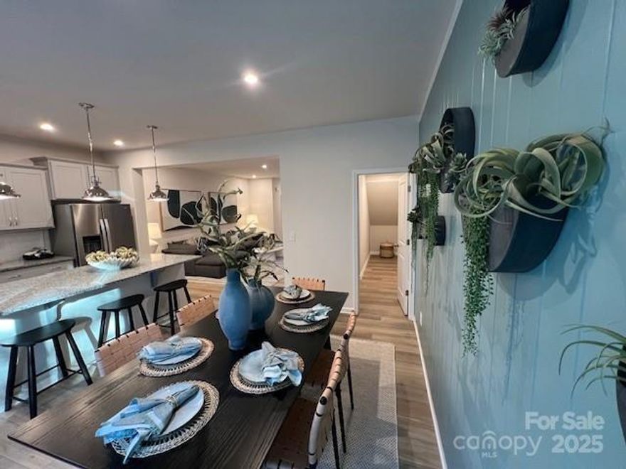 **THIS HOME IS COMPLETE AND WAITING FOR YOU!  LET US SHOW YOU YOUR DREAM HOME!**
Welcome to The Amira, a beautifully designed townhome offering modern comfort and stylish living.  Th first floor features a welcoming front porch and foyer, leading to an open and inviting gathering room.  The spacious kitchen boasts a walk-in pantry, ample counter space, and flows seamlessly into the breakfast dining area.  A powder room and access to the one-car garage add convenience, while the patio provides a perfect out door retreat.  

Upstairs, a large loft offers flexible living space.  The owner's suite is a true sanctuary with a walk-in closet and an en-suite bath featuring a shower with seat and dual vanity.  Two additional bedrooms, a full-size bathroom, linen closet, and laundry room complete the second floor.

With its thoughtful layout and modern finishes, The Amira is designed for effortless living.  Schedule your showing today!