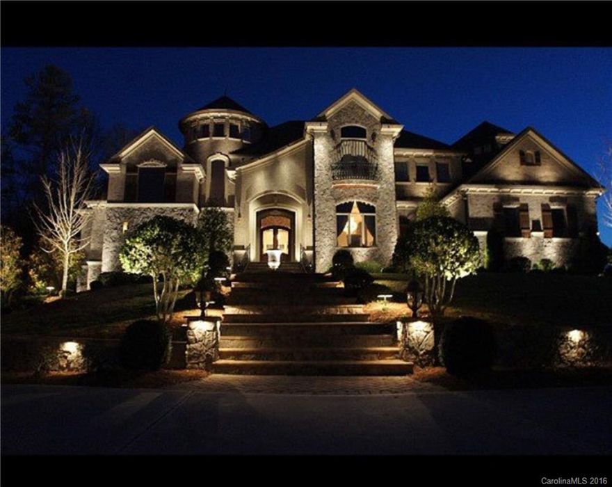 TOP of the Hill VIEW in Prestigious Gated Providence South!Luxury living in this exquisite home invites you with immediate curb appeal.Gourmet kitchen,5 mini bars,6 fireplaces,$100,000 worth Savent System entertainment wired throughout.Screened-in porch w/ fireplace,outdoor kitchen overlooks GORGEOUS heated salt-water marbled pool. Basketball court with plenty of privacy in fenced yard.Gated community with clubhouse pool and numerous of other amenities.