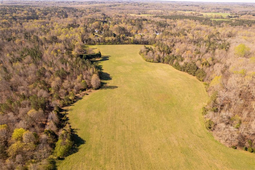 This beautiful land backs to an additional parcel at MLS 3829627 Miller Pond Rd for a total of 86+/- acres. Partially cleared and partially wooded.  This parcel includes one brick house with a two car garage.