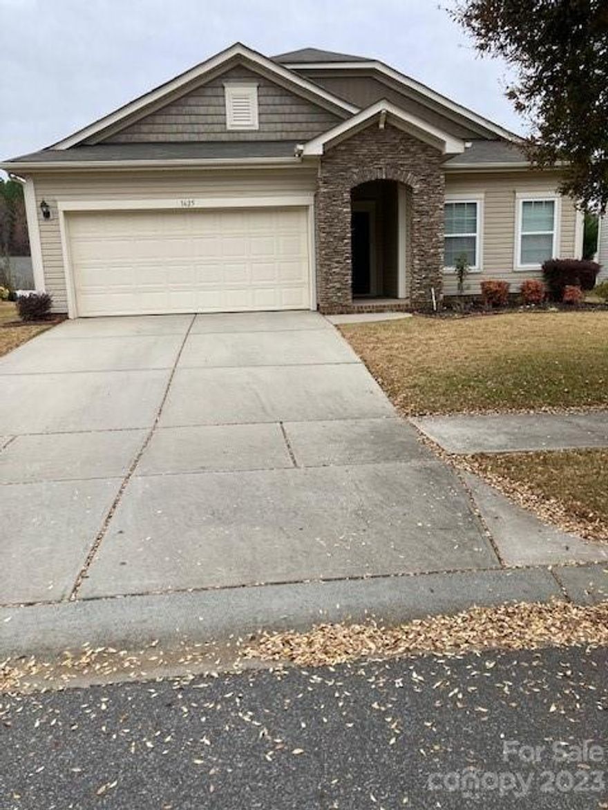 Lovely three bedroom ranch in well established desirable neighborhood in The Farms Subdivision East Charlotte, with immaculate laminate flooring in living areas, open floor plan with split bedroom plan, two car garage, private back yard,  close to major thoroughfares shopping and dining.