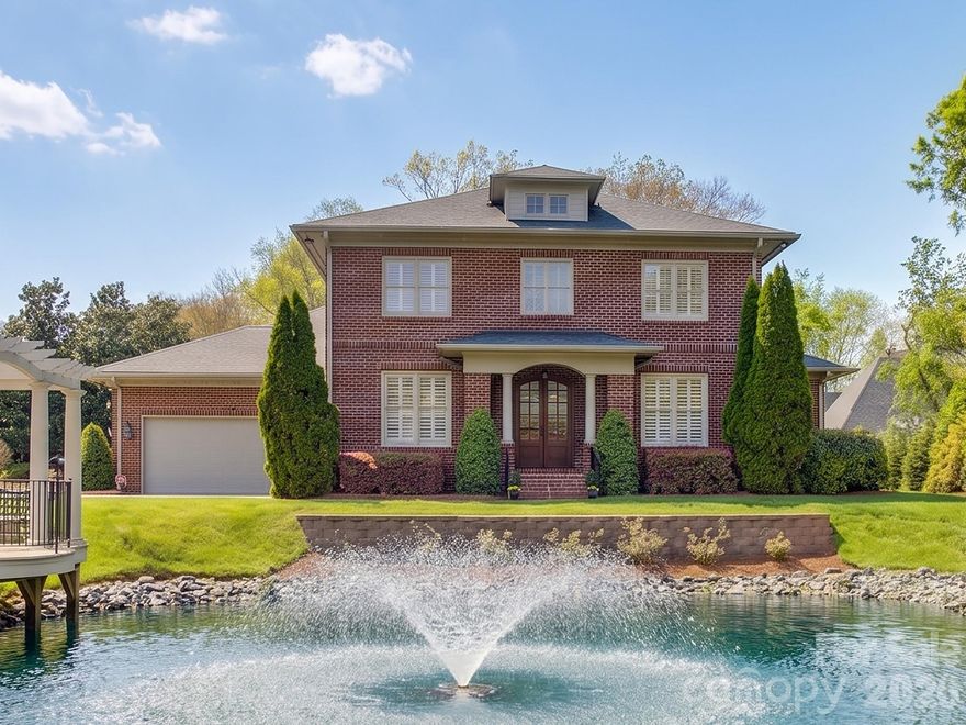 Welcome to this exceptional, full brick, two-story showstopper that lives like a single-family home with amazing detail and pride of ownership throughout~ this is a rare opportunity to own a luxury, lock and leave property with main level primary suite, just minutes from SouthPark and the desirable Carmel and Quail Hollow Clubs.  This home is situated in the back of the community and offers the ultimate location for peace and privacy. Nestled between two ponds and lush landscaping, you will enjoy morning coffee or evening refreshment relaxing on the newer custom deck with Trex flooring. Details include 10'ceilings, 8'doors, impressive heavy moldings, gleaming wood floors and plantation shutters throughout.  The custom chef's kitchen with abundant cabinetry and stone counters is complete with Viking gas range, new SS Kitchen Aid dishwasher, double ovens and professional appliances.  The private main level primary suite overlooks the inviting pond with water feature. The large primary bath has dual vanity, whirlpool soaking tub, walk-in shower and large owner's closet with custom organization system. The upper level provides three generous bedrooms with direct bath access and walk-in closets for abundant storage.  Wonderful study/flex room is perfect for working from home. Oversized two car garage with epoxy floor and wide driveway for ample guest parking ~ don't miss this incredible property!