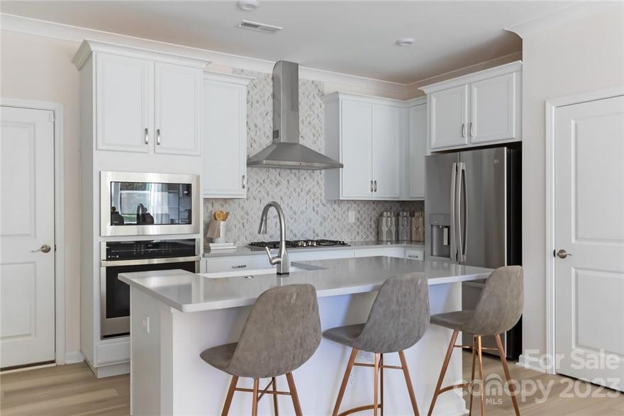 Lovely February Move-in Fully Furnished Model Home for Sale with a White and Grey Gourmet Kitchen w/ 36" Gas Cooktop, 36" Electric Fireplace, Upgraded Oversized Tile Primary Shower, Open Rail Staircase on Both Floors w/ Oak Box Steps, Upgraded Secondary Bathroom w/ Added Sink and Tub Surround, Upgraded Laundry w/ Added Door, and Crown Molding Across Entire House at a Competitive Price. 

All Furniture, Artwork, Wall Hangings, Window Treatments, TVs, Rugs, Light Fixtures, and Appliances (Refrigerator, Washer, and Dryer), are included with purchase.

The gourmet kitchen upgrade presents a 36" gas cooktop, elevated stainless steel appliances, upgraded white cabinets, white marble backsplash tile, all tied together by the high-end Eternal Serena quartz counter tops. The great room has a stunning 36" electric fireplace, complimented perfectly by the lovely front courtyard. Upstairs, there are three bedrooms, including the primary suite, featuring an upgraded oversized tile shower.