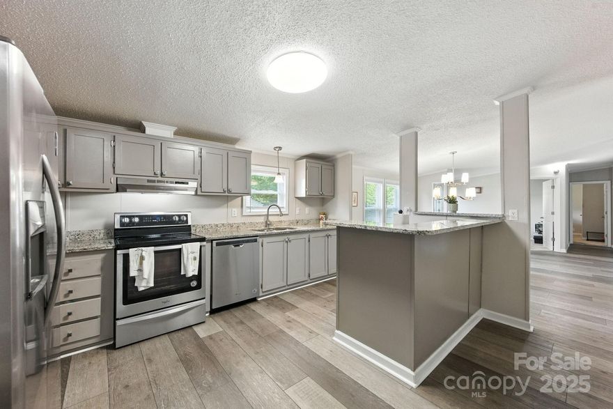 It’s hard to believe you can have such a large and beautifully updated home at this price point. The kitchen features granite countertops, stainless steel appliances, and abundant cabinet space. Perfect for everyday living and entertaining. The open living area showcases stylish LVP flooring and great natural light. The oversized primary bedroom offers a true retreat with a sitting area, large walk-in closet, and spa-like bath. With four bedrooms and an office, there is plenty of room for everyone. You’ll love the backyard just as much as the home itself, enclosed with a a privacy fence for enjoying the deck and a covered patio; ideal for relaxing or hosting friends. This property has been secured with a VA loan and the LOW interest rate may be assumable, offering an exceptional opportunity for qualified buyers. Don’t miss your chance to make this beautiful, move-in ready home yours!