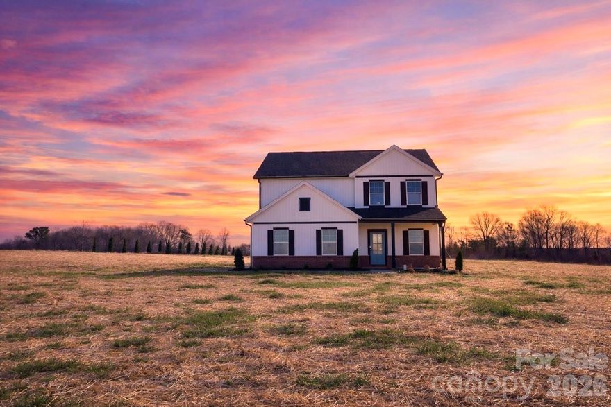 Home is complete! Absolutely stunning long range mountain views from your front porch of this beautiful new construction 3 bedroom 2.5 bath farm house. Sits on gorgeous 2.25 acre lot. This home has great attention to detail with features such as a shiplap drop zone, gorgeous subway tiled shower & nice neutral lvp floors throughout. Upon entering, you will find a designated office. Large, cozy living room with shiplap wall open to elegant kitchen equipped with fresh white soft close cabinets, stunning calacatta quartz countertops & white subway tile backsplash with oversized pantry. Enjoy entertaining at the large kitchen island with plenty of seating. Upstairs get cozy in the spacious loft with endless possibilities. Primary bedroom with separate vanities, oversized shower and generous walk in closet. Two bedrooms, full bath and laundry room are also upstairs. Enjoy evenings on covered back porch overlooking natures beauty perfect for relaxing and outdoor gatherings. Conveniently located 10 minutes to I77 and approximately 30 minutes to Winston-Salem.