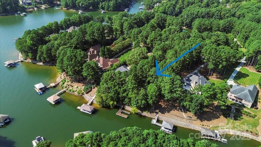 Located in the prestigious neighborhood of Northview Harbour, this stunning waterfront lot offers an unparalleled opportunity to build your dream home on the shores of Lake Norman. Enjoy views of the lake & surrounding lush greenery, creating a serene setting. Situated on prime waterfront, this lot has direct access to the waters of Lake Norman, perfect for water enthusiasts & nature lovers. Imagine waking up to the gentle sounds of lapping waves & colorful sunsets. Northview Harbour is known for its upscale homes & exclusive community amenities. Enjoy a sense of tranquility while still being within proximity to dining, shopping, & entertainment options.
BAAS builders has teamed w/ Pippin Home Designs to bring to life a stunning contemporary home! This project will showcase a commitment to meticulous craftmanship & cutting edge design, setting a new standard for luxury living. Home design & renderings coming soon!  Or, you can bring your own plan & builder of your preference!