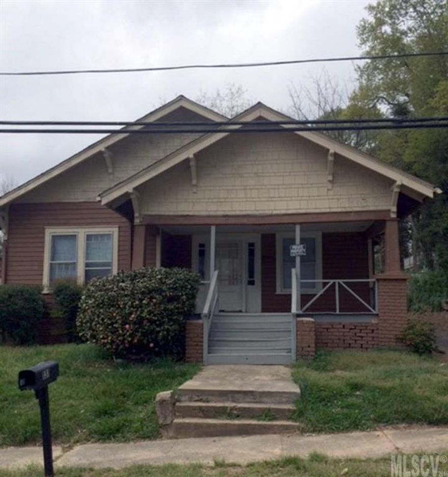 All brick, two bedroom, one bath home with office area or possible 3rd bedroom in downtown location. With some "TLC" this home would make a great rental or for first time homebuyer.