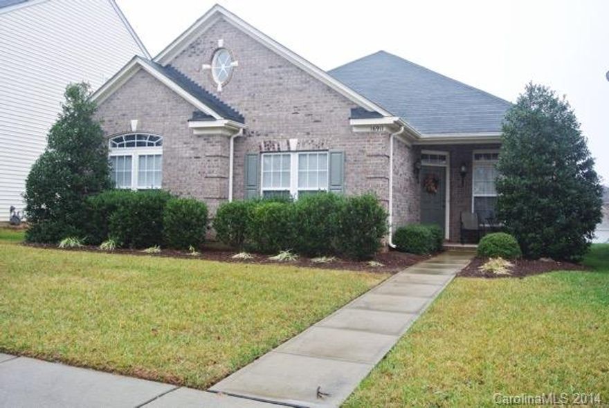 Just what you've been waiting for!  Brick and vinyl ranch with 3 BR's down, plus a BR and full bath upstairs!  Open plan with vaulted ceilings, fans in every room.  Beautiful wood floors in the living areas.  Neutral colors.  Master Bath has garden tub, separate shower, 2 sinks, 2 walk-in closets.  Berber carpet in the BR used as an office.  Very nicely landscaped with rose bushes around the patio.  Storage space in garage.  All for less than $250,000!