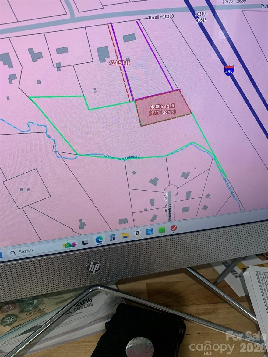 5.39 Ac.  in Mint hill     there is a creek on the back of it so some portion may not be buildable,  might need special permits.   the land has  a 15foot easement the property.  But I might be willing to sell a strip of 1000-15 feet more off my adjoining land.