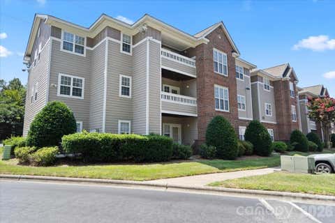 Photo of 9810 Campus Walk Lane #H, Charlotte, NC 28262 (MLS # 4405400)