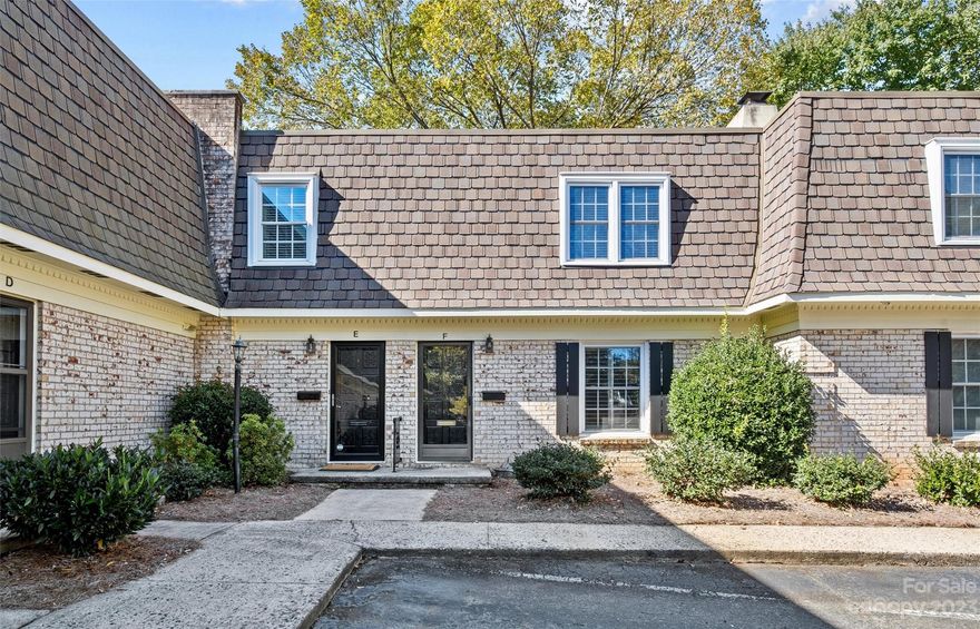 Fantastic opportunity for low-maintenance living and affordable entry into the heart of South Park! The Trianon community is just minutes from countless shops, restaurants, and entertainment options in one of the most thriving districts that Charlotte has to offer. This 2-story unit has been wonderfully updated and features hardwood floors, charming moldings, and a popular open floorplan on the main level.  Spacious living room with wood-burning fireplace. Updated kitchen has granite countertops and stainless appliances plus cozy breakfast nook. Dining room with sliding glass doors leads to the garden patio, complete with wooden privacy fence. Powder room and laundry on main! Upstairs find two large bedrooms each with en-suite bathrooms and abundant walk-in closet storage. Great community amenities with clubhouse and pool, and easy parking for owners and guests!