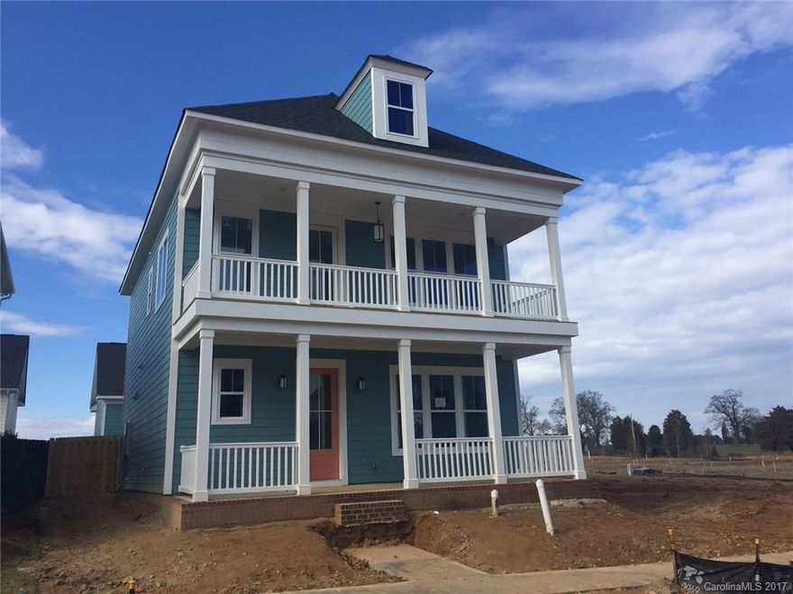 Gorgeous double stacked front porch! Dream kitchen offers plenty of prep space and is open to the gathering room. Private 1st floor guest suite w/ a full bath. 2nd floor loft has access to the upper level porch. Lots of features like 10' ceilings on first floor, upgraded cabinets, granite & huge walk-in pantry w/ wood shelves. Lots of wood floors & tile in all baths and laundry. Owner's suite w/ separate closets and huge corner shower. Rear yard is fully fenced & has full sod & full irrigation.