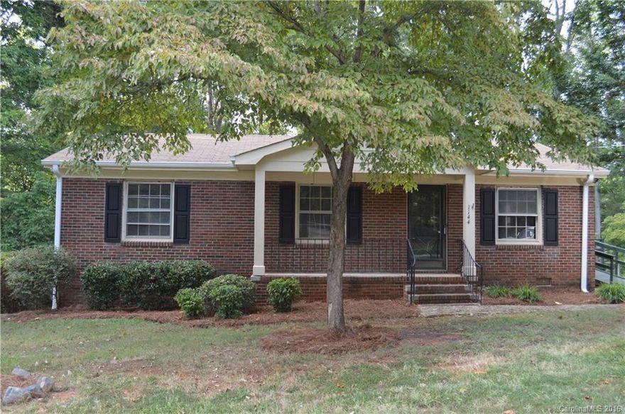 Incredible totally renovated 3 bedroom home--ready to move in and make it yours.   Beautiful new paint, gorgeous new laminate wood floors throughout, new HVAC, amazing new bathroom with gorgeous tile, tub, vanity, new upgraded electrical system, kitchen fully furnished with appliances, new vapor barrier etc.  Enjoy your morning coffee on the charming front porch and the privacy of the fully fenced in back yard.  Too many upgrades to mention--hurry to see this wonderful home.