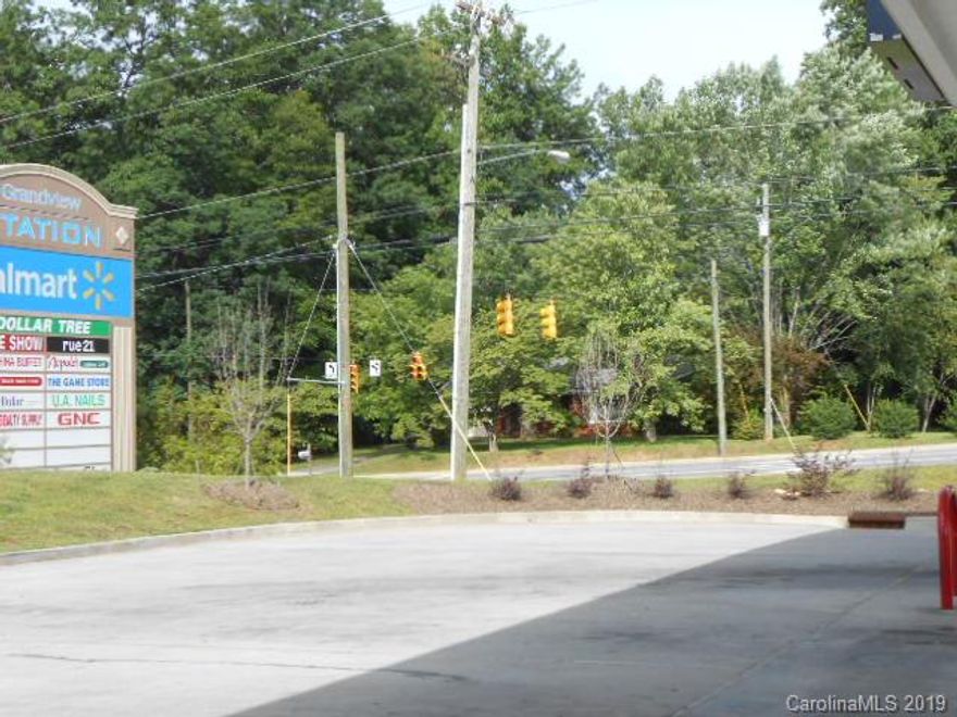 PRIME Commercial Property with maximum visibility from two vantage points. (Directly across from Walmarts main Entrance ) Less than 1/8 of a mile to I-40.City Water and sewer available .Most all new Commercial Development in the past 2 yrs Has been on Sugar Hill RD.( 210 FT of road frontage ) In McDowell County this area is poised for more development, More land available!