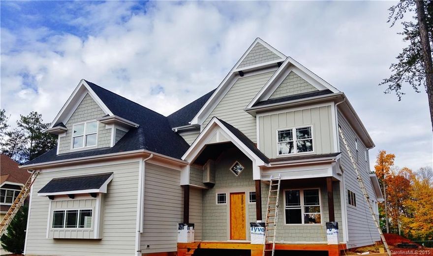 NEW CONSTRUCTION with water views almost complete! This small community has lake access & an amenities area. All homes have been built by the same award-winning builder using standards that insure the resale value & integrity of the neighborhood. Main features: Master on the main, 3 car garage, Italian gas range, custom sliding glass door and much more. This builder's homes do not last long, especially on the Brawley School Road Peninsula. The last spec built was Under Contract in 4 days!