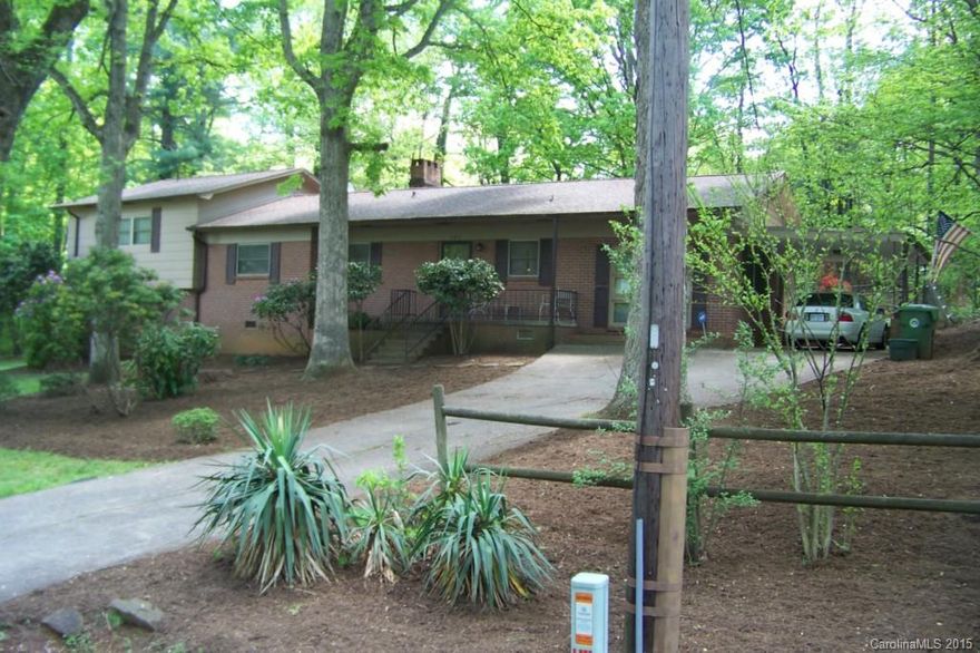 Spacious 4 bedroom home and asking $24,000 less than tax value. The adjacent lot to the left of the home is included for a total of 1.75 acres of land in the City of Conover yet still feels private. Enter Great Room with custom built-ins and fireplace w/woodstove insert (hardwoods under the carpet). Great Room has doorway to sun porch to observe nature with large fenced-in area. Eat-in kitchen, refrig, freezer, washer, & dryer to remain. Enclosed carport for a 2nd Den with Laundry Room.