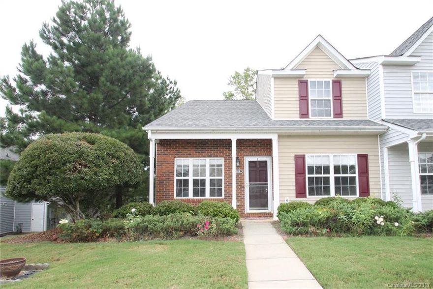 Conveniently located end unit in desirable Indian Land Community. 1st floor master suite located off the 2-story foyer. Great room has charm w/ its corner fireplace. Bright kitchen has plenty of natural light & features black appliances, dining rm, pantry, powder rm, & sliding glass doors leading to the extended patio. Upstairs, 2 guest bedrooms share a full bath. Delightful patio w/ tree-lined view, extended flower beds & privacy partition. New carpet & neutral paint-This home won't last long!