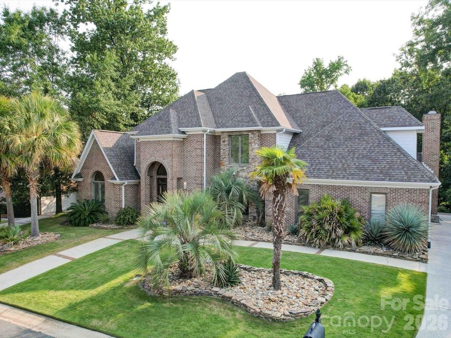 Welcome to the fabulous South Charlotte community of Riverpointe! Life's just better when you live on the lake. This home has been meticulously updated with an all new kitchen, white oak flooring, and Trex decking. The HVAC system was just replaced in 2023! There's so much to love in this home, where you can entertain the masses or sneak away to your expansive primary suite. Soak in the hot tub while burning a fire in the custom brick fireplace. For the lake lovers, boat slips are available to lease at the neighborhood marina. The neighborhood has a variety of on-site amenities including a community pool, tennis and basketball courts, and a playground for the kids! Come check this home out before it's gone!