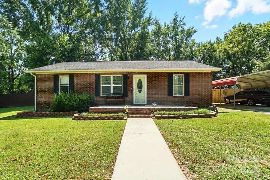 Location, Location, Location! Welcome to 244 E East Avenue in charming Monroe. This delightful 3-bedroom, 2-full bath brick home offers a perfect blend of comfort and convenience. enjoy a spacious fenced backyard shaded by matured trees-ideal for gatherings or simply relaxing outdoors. The covered carport adds practically, while the home's living layout makes daily living a breeze. This Listing it's situated just minutes from Uptown Monroe, you'll have a quick access to shops, restaurants, and local attractions. Whether  you're looking for your first home or the perfect place to downsize, this property delivers comfort, charm, and an unbeatable location